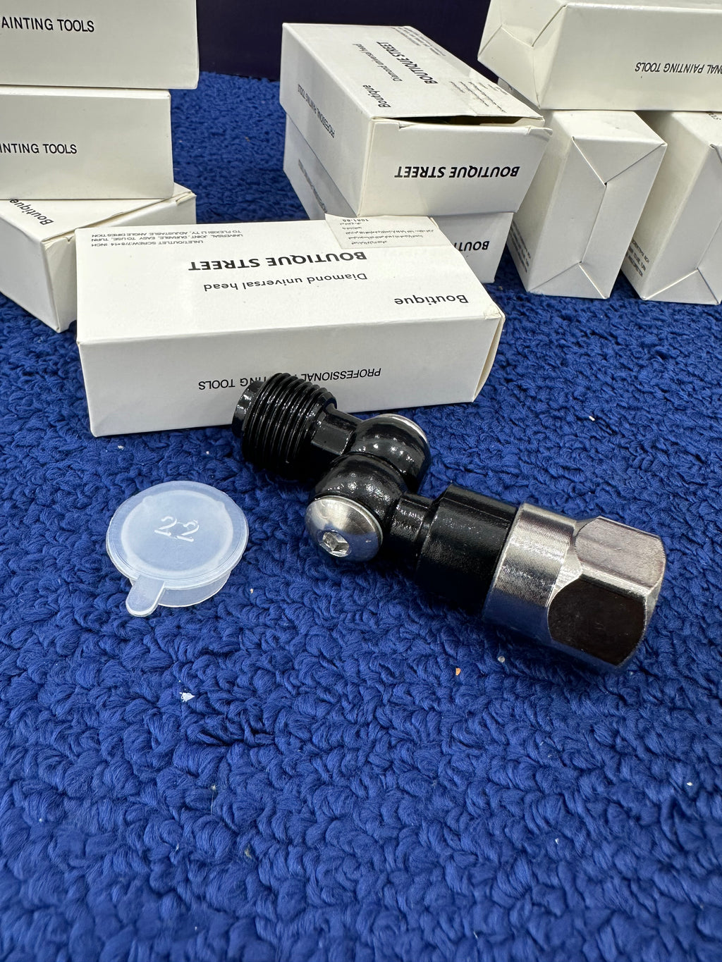 Adaptateur articulé pour pistolet Airless